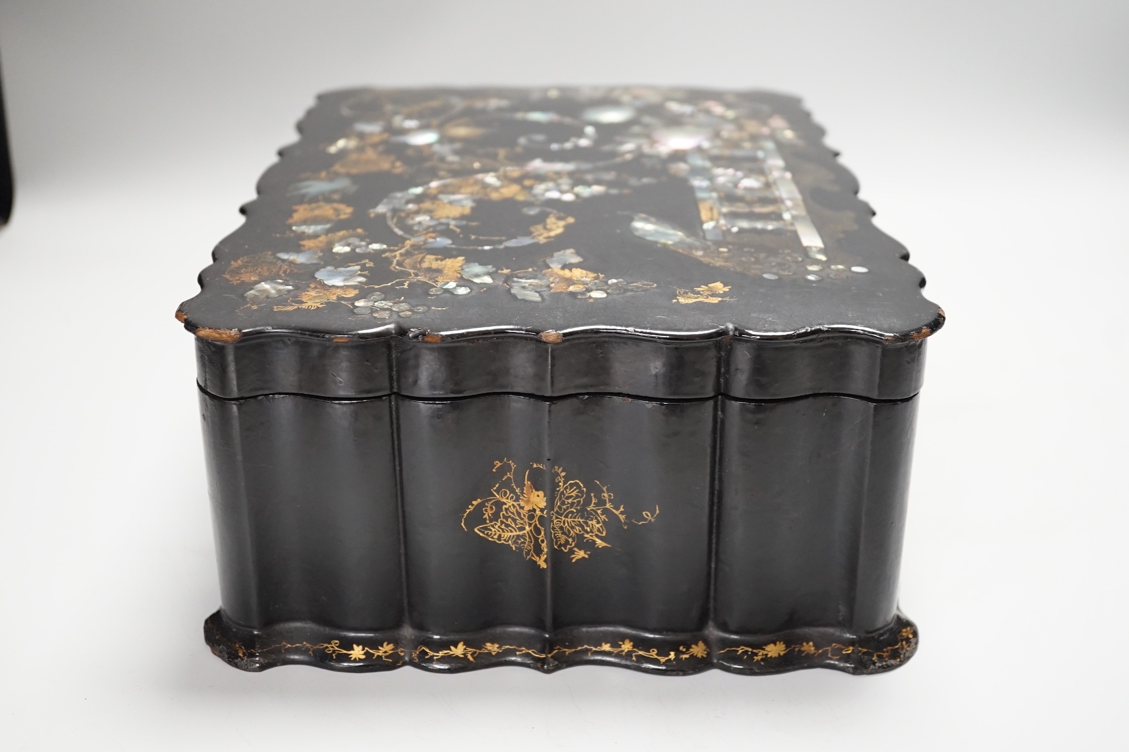A Victorian papier mache workbox and contents, 32cm